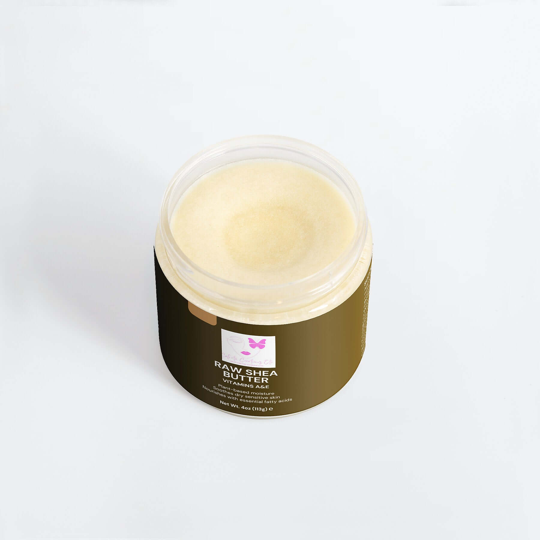 Organic raw shea butter in a brown container, unrefined and plant-based moisturizer for skin and hair.